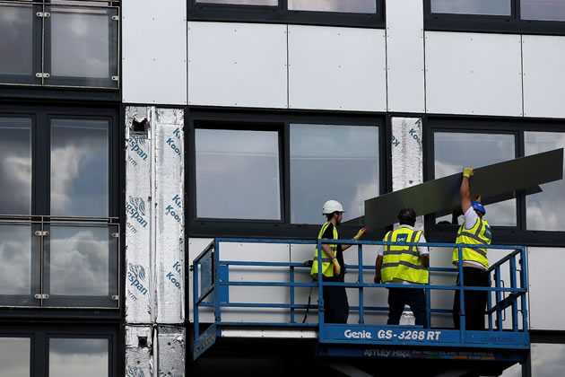 Cladding being replaced on a non-compliant building