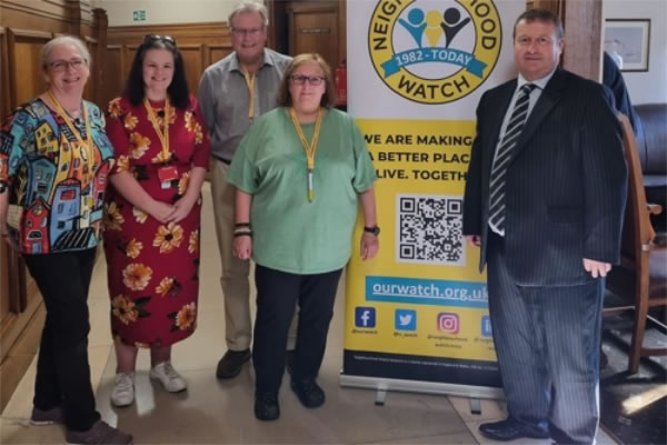 L-r: Jan Forbes, Cheryl Spruce from the National Neighbourhood Watch Network, Cllr Graeme Henderson, Vice-Chair Sylvie Chrzanoswka and police Superintendent David Bannister