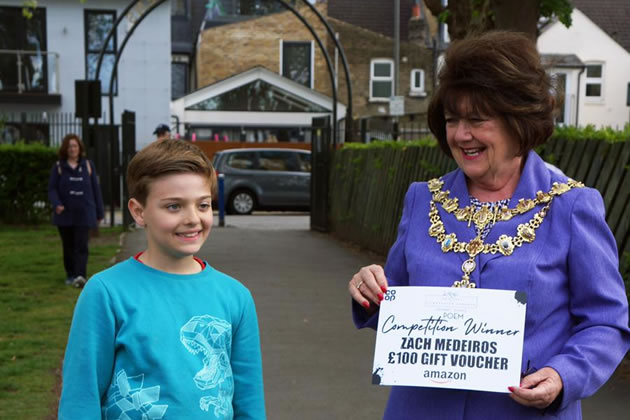Zach receives his prize from the Mayor of London Jane Cooper 
