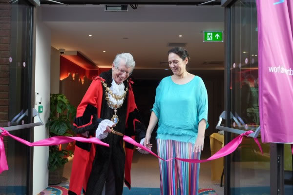 The Mayor of Wandsworth cuts the ribbon with Sahana Gero, founder of World Heart Beat